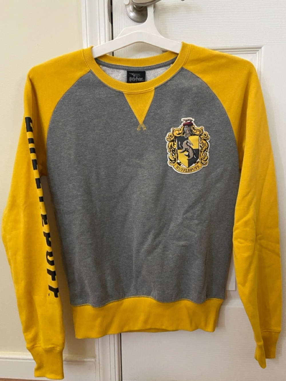 Wizarding World Harry Potter of Hufflepuff logo sweatshirt